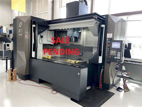 Vertical CNC machine for wood and panels .